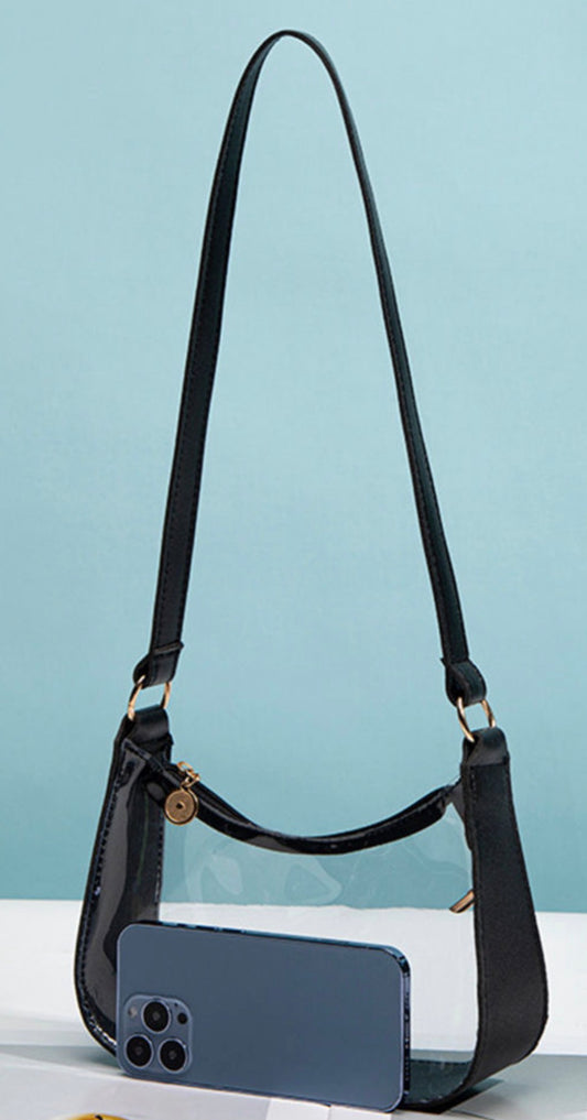 Clear ML57 purse with black strap and gold zipper, stylish Ivy's Gifts & Boutique accessory perfect for modern fashion.