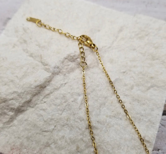 Silver Tree of Life necklace from Ivy's Gifts & Boutique, featuring a detailed pendant with intricate tree design.