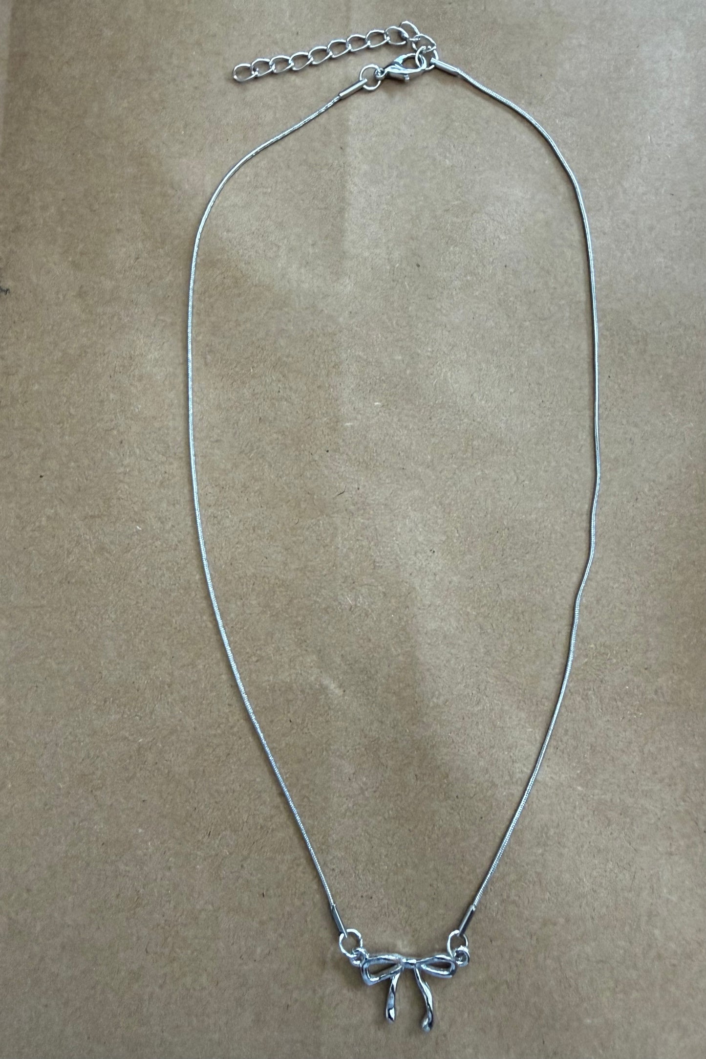 J17 Silver Necklace with Bow Design