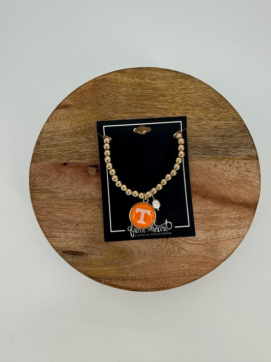 Gold Beaded Power T Stretch Bracelet with Pearl accent from the heart