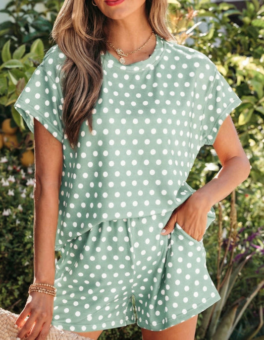 Green polka dot 2-piece short set for girls by Ivy's Gifts & Boutique, featuring a sleeveless top and matching shorts.