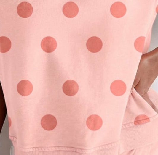 Pink polka dot ribbed trim 2-piece skort set by Ivy's Gifts & Boutique, featuring a stylish coordinated top and skirt.