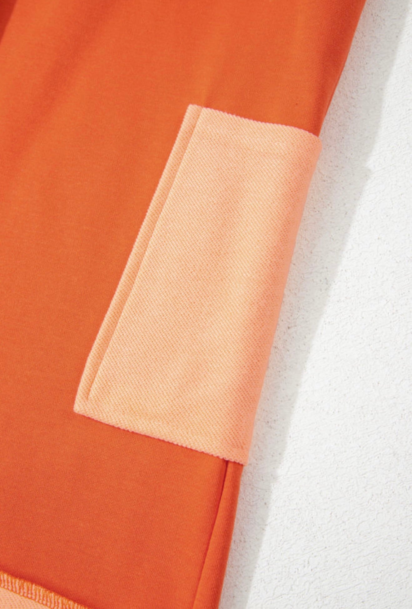 Orange Romper with Peach French Terry Trim and Oversized Pockets