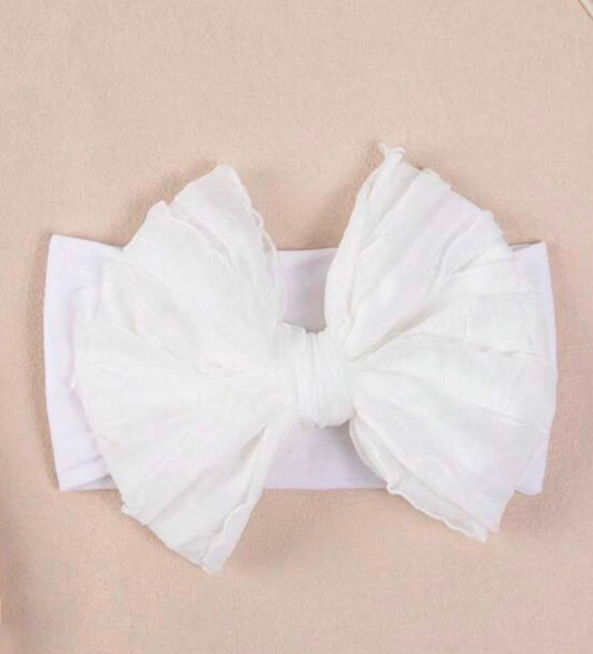 Baby infant headband with bow, soft and comfortable, by Ivy's Gifts & Boutique, perfect for little girls.