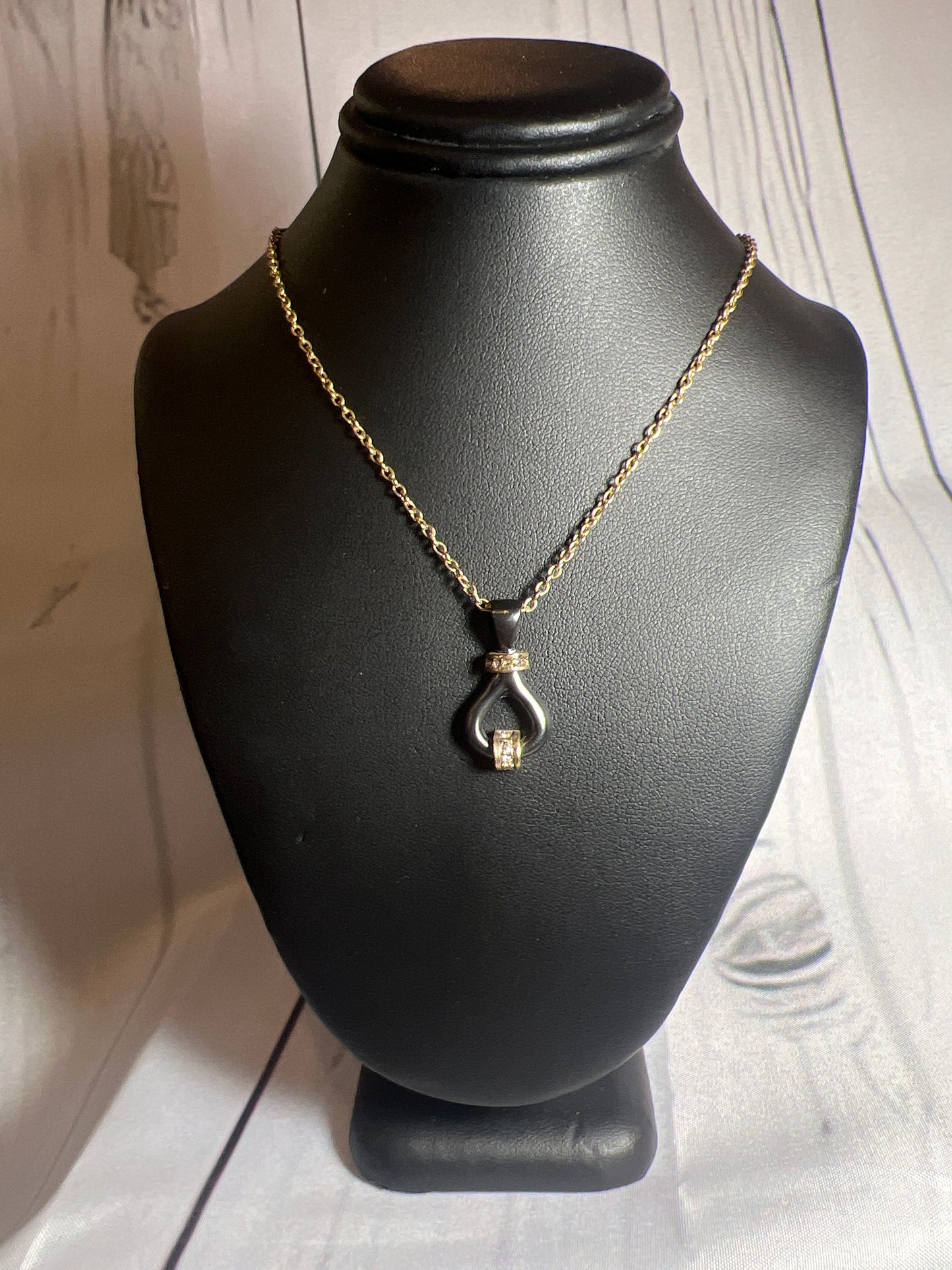 Matte black and gold with diamonds necklace