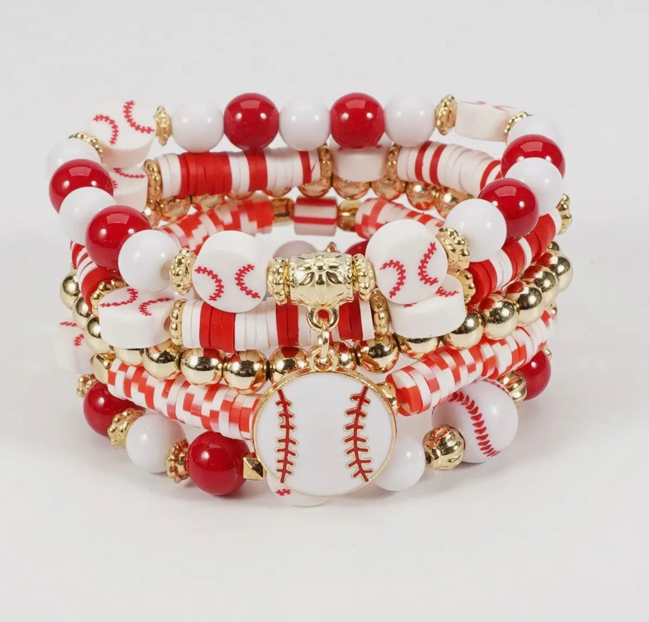 Red and white stackable stretch bracelet set featuring a baseball theme from Ivy's Gifts & Boutique.