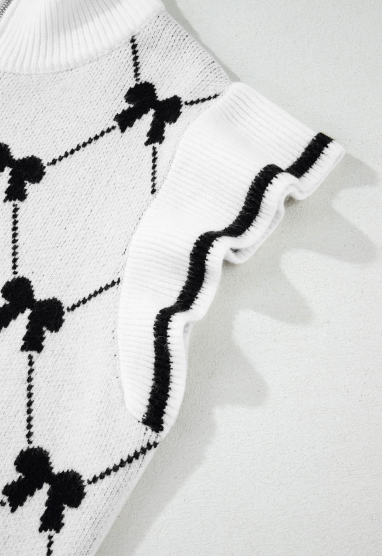 White Zipper Sweater with Black Bow Print