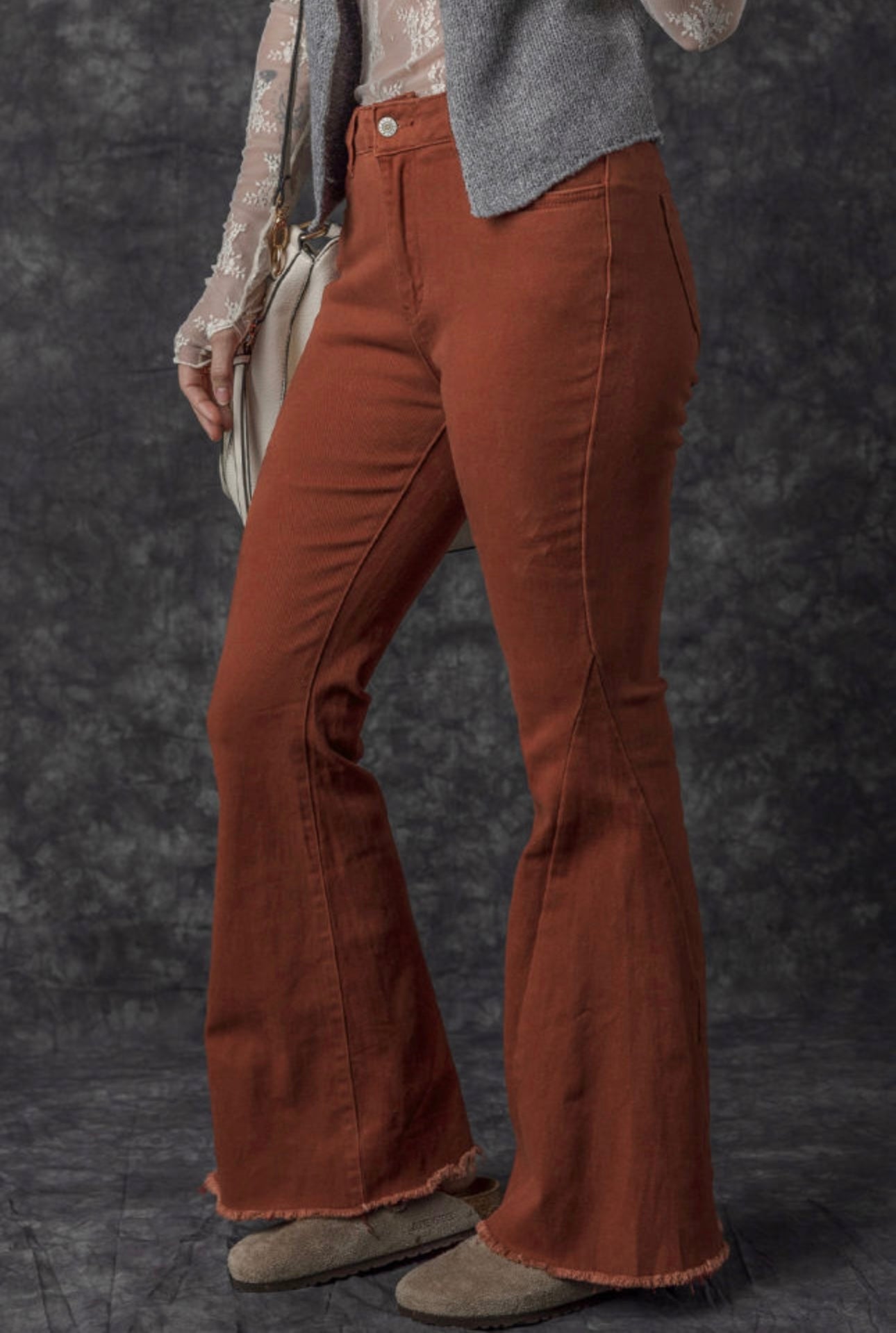 Rust Bell Bottom Jeans with frayed edge