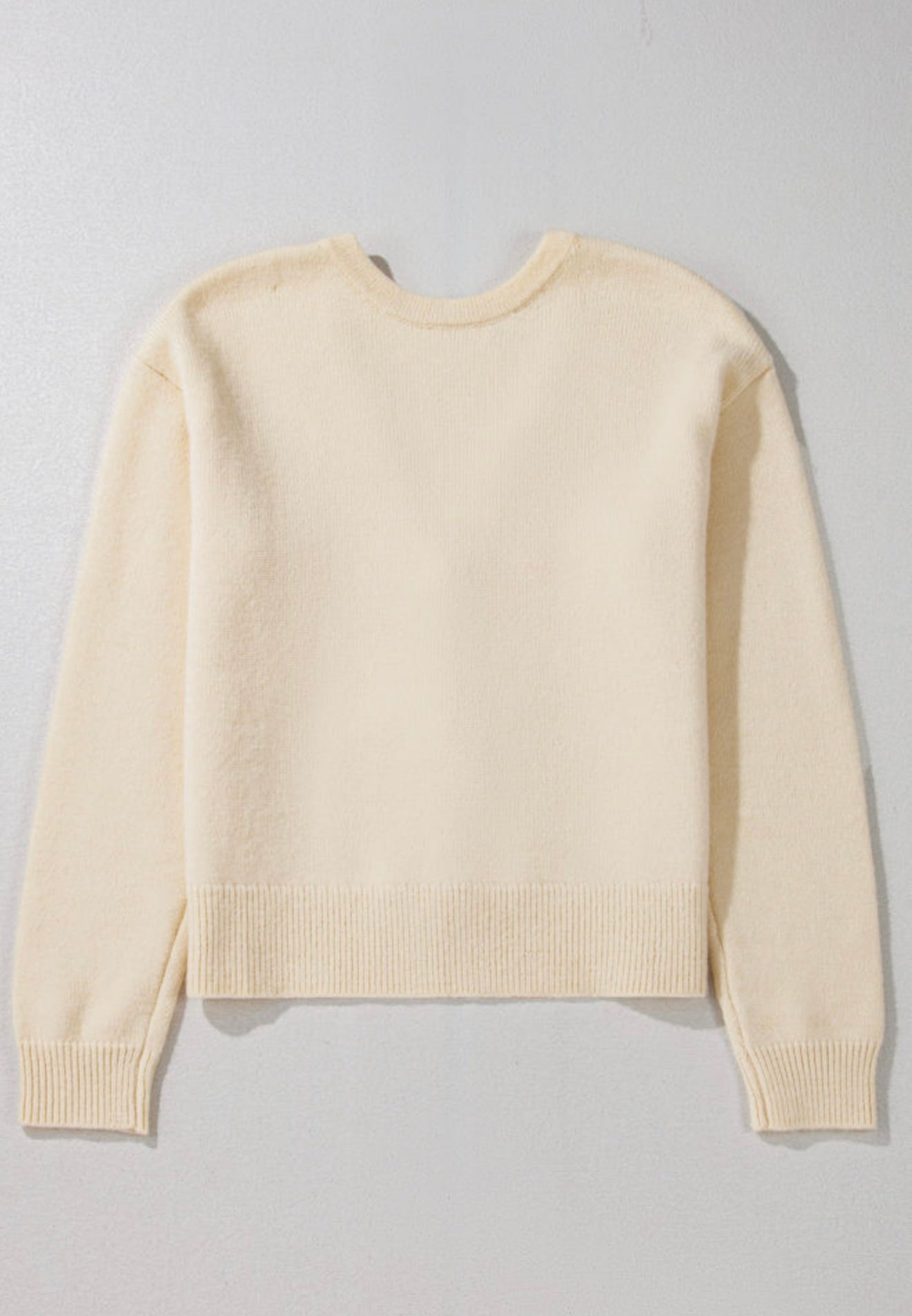 Ivory cream sweater with bows