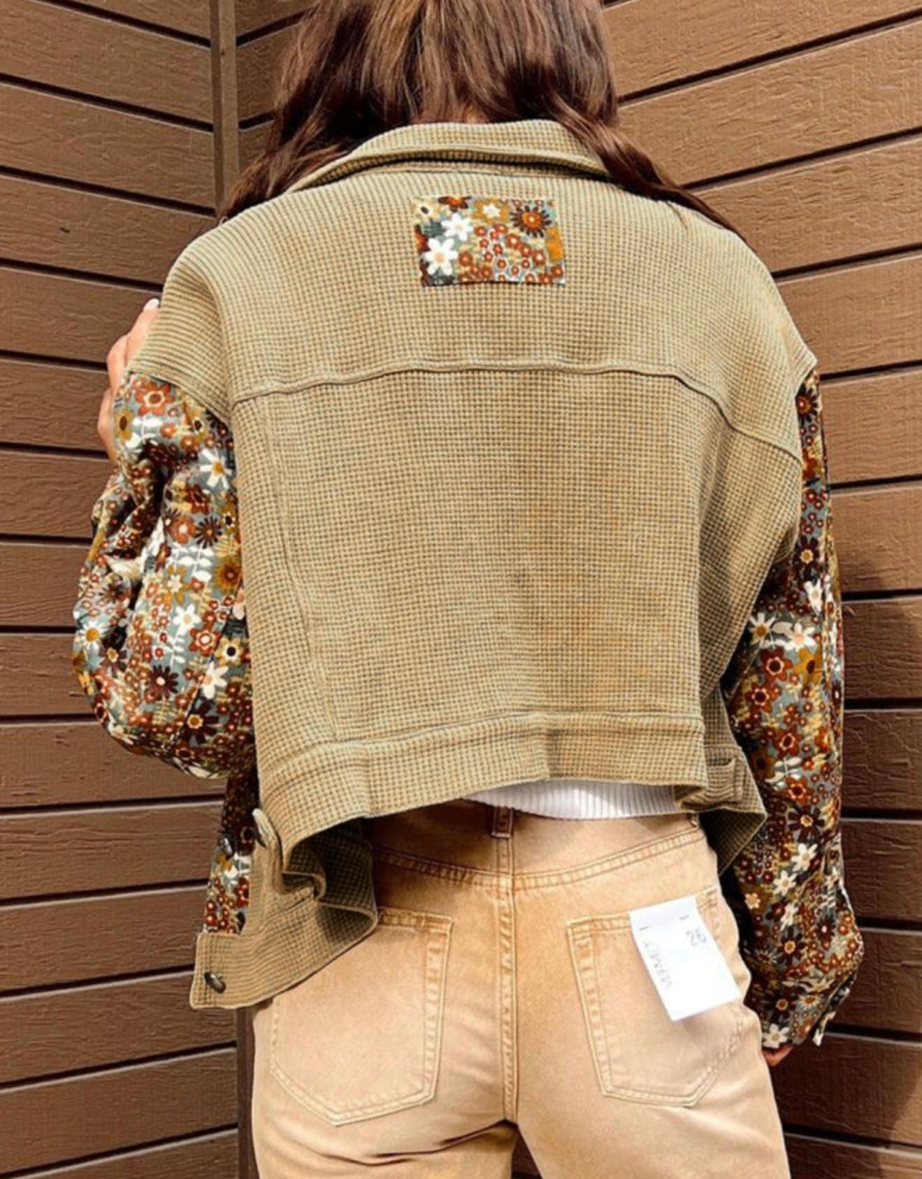 Tan waffle weave jacket with floral sleeves