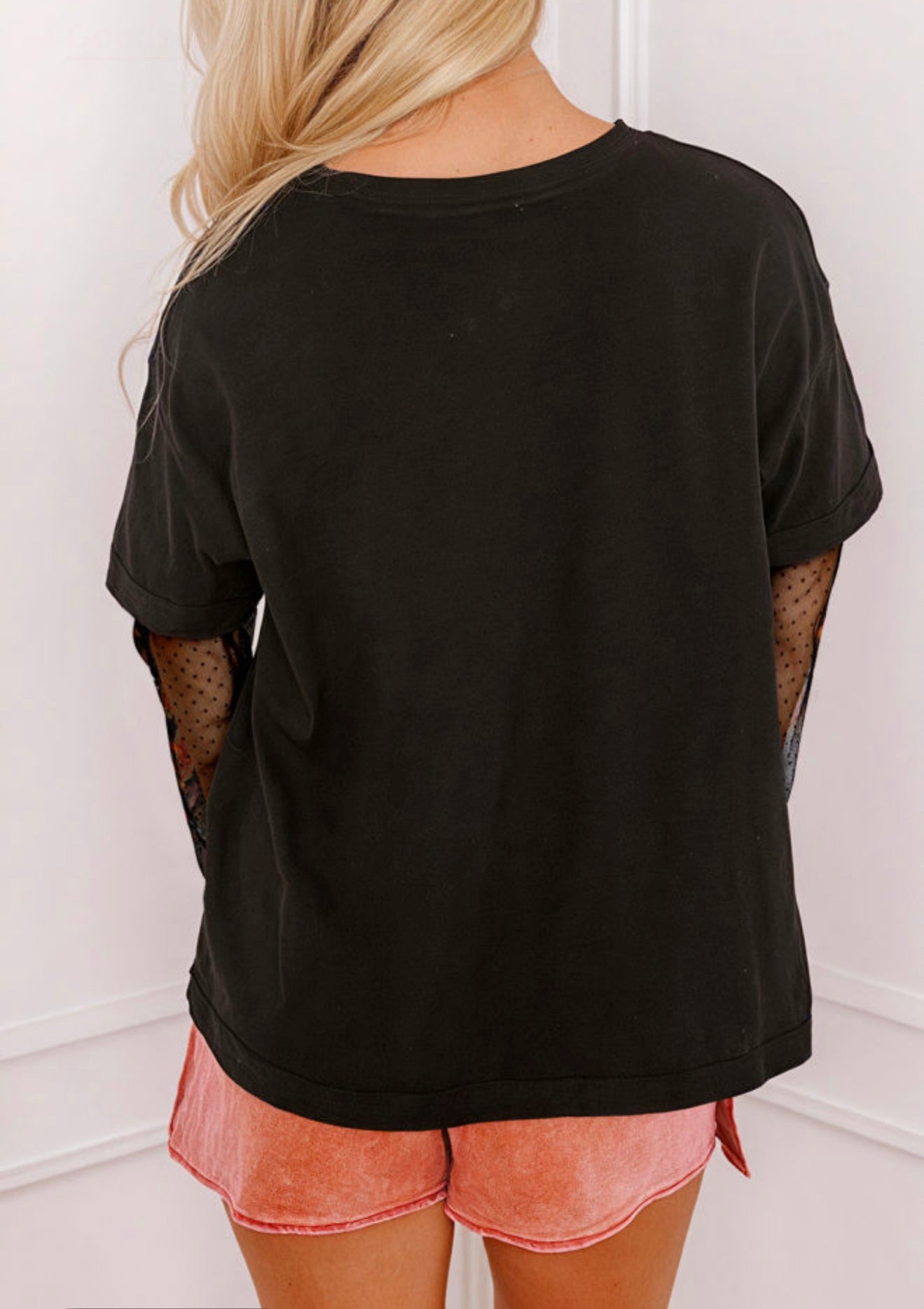 Black T-shirt with sheer floral sleeves