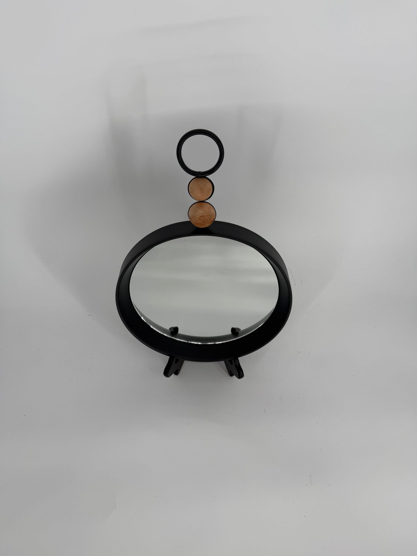 Black Metal Mirror with Wooden Bead Accent
