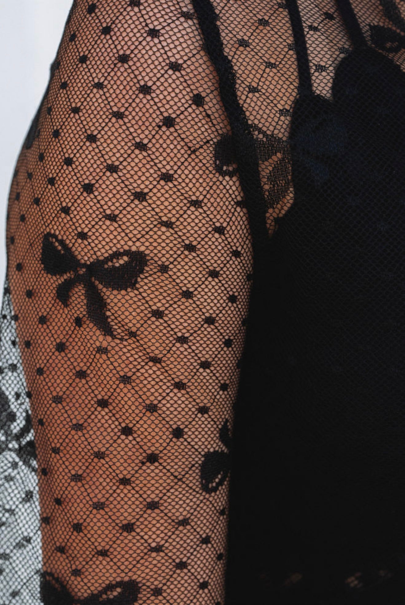 Sheer Top with Bow Details in Black
