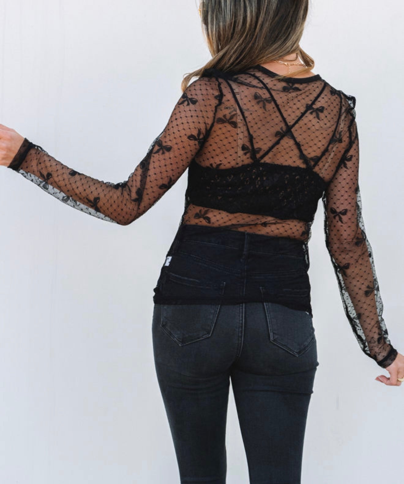 Sheer Top with Bow Details in Black