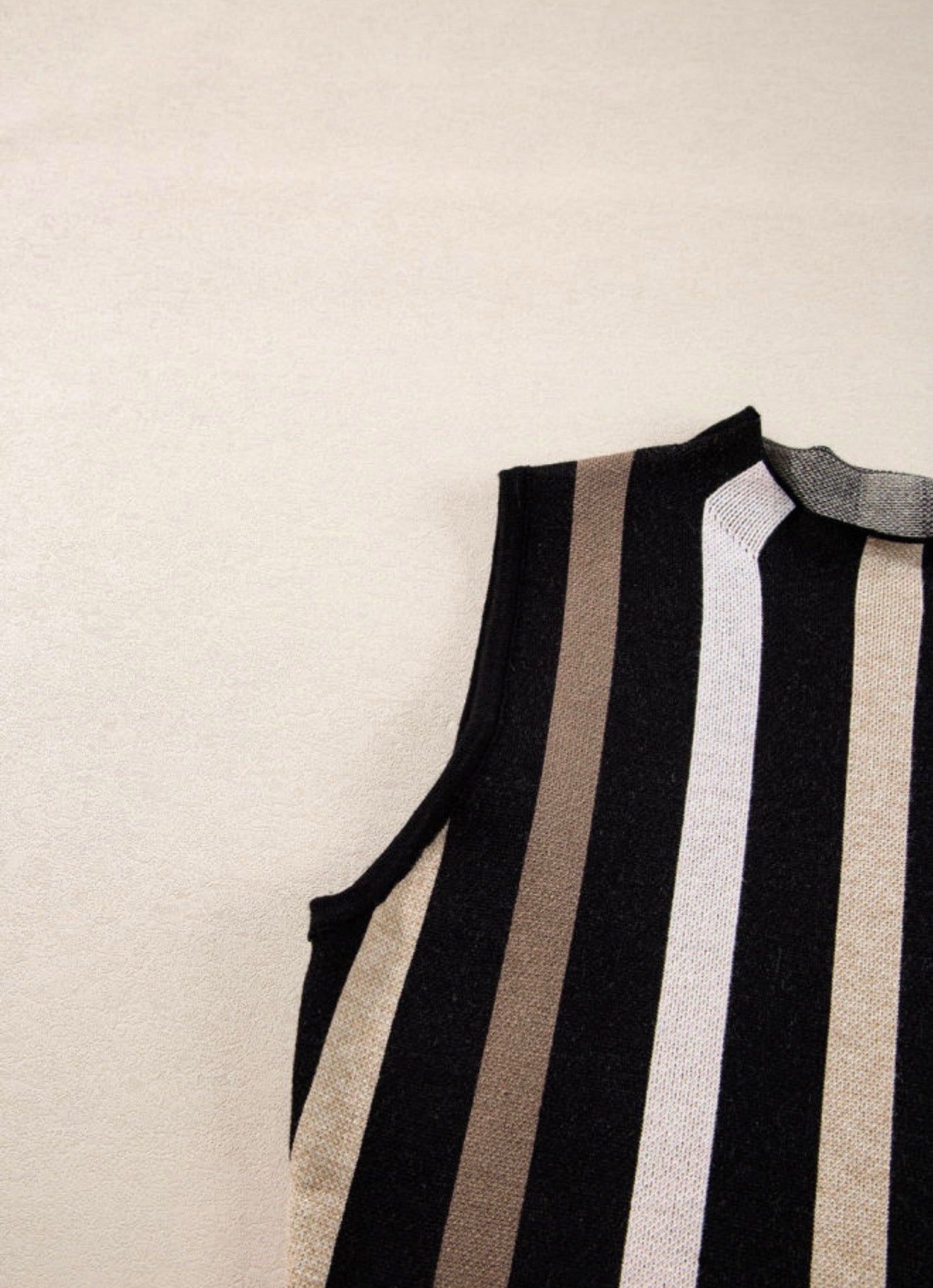Black sleeveless sweater with Brown Stripes