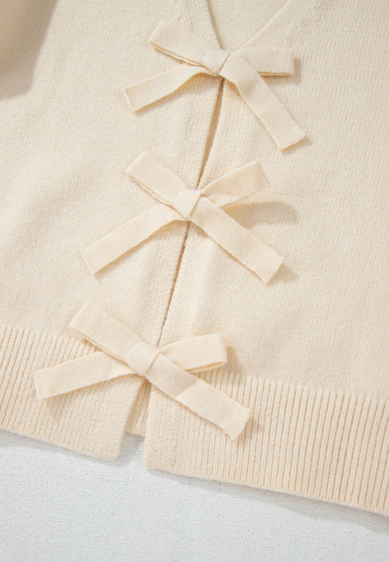 Ivory cream sweater with bows