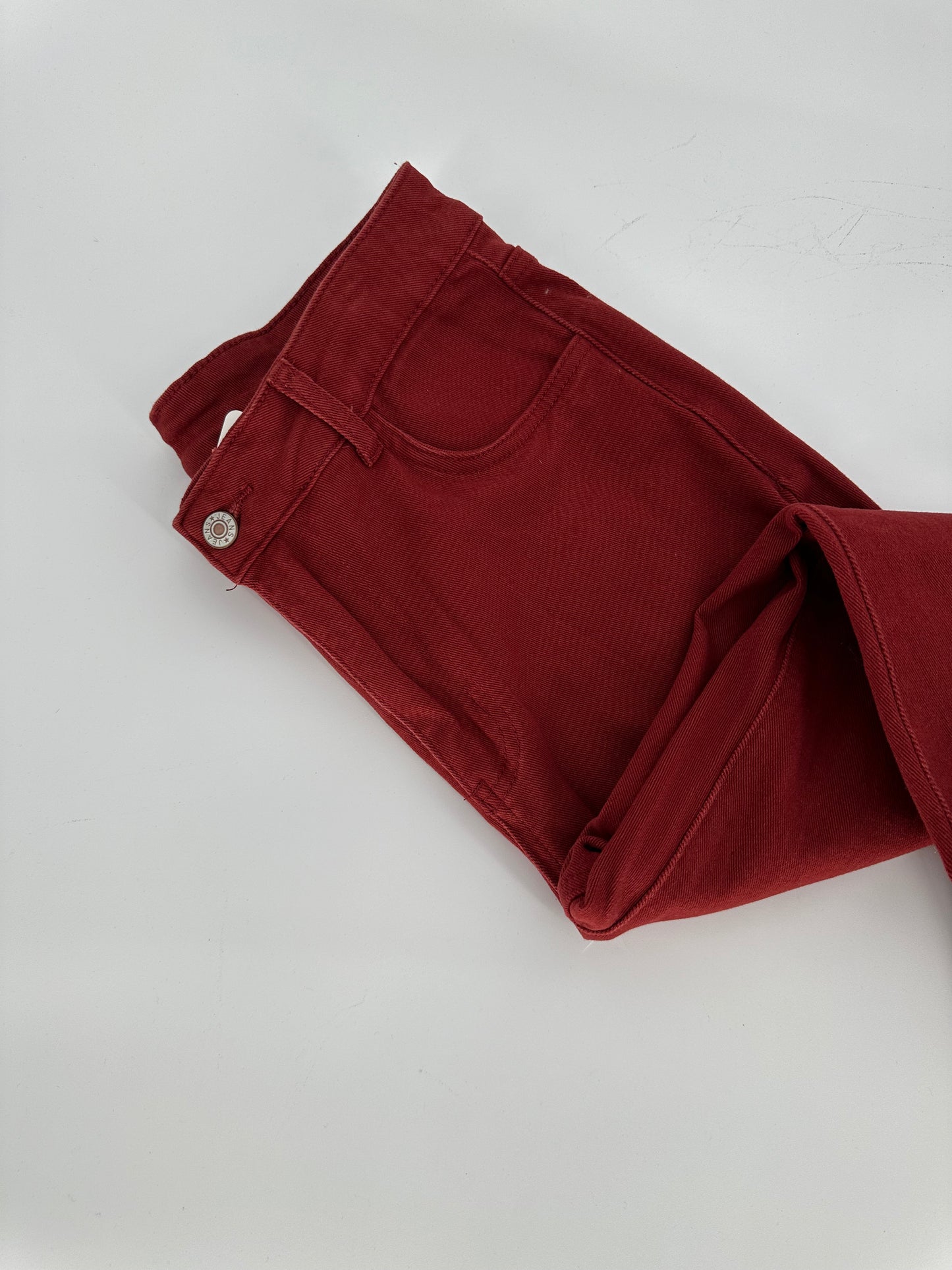 Rust Bell Bottom Jeans with frayed edge