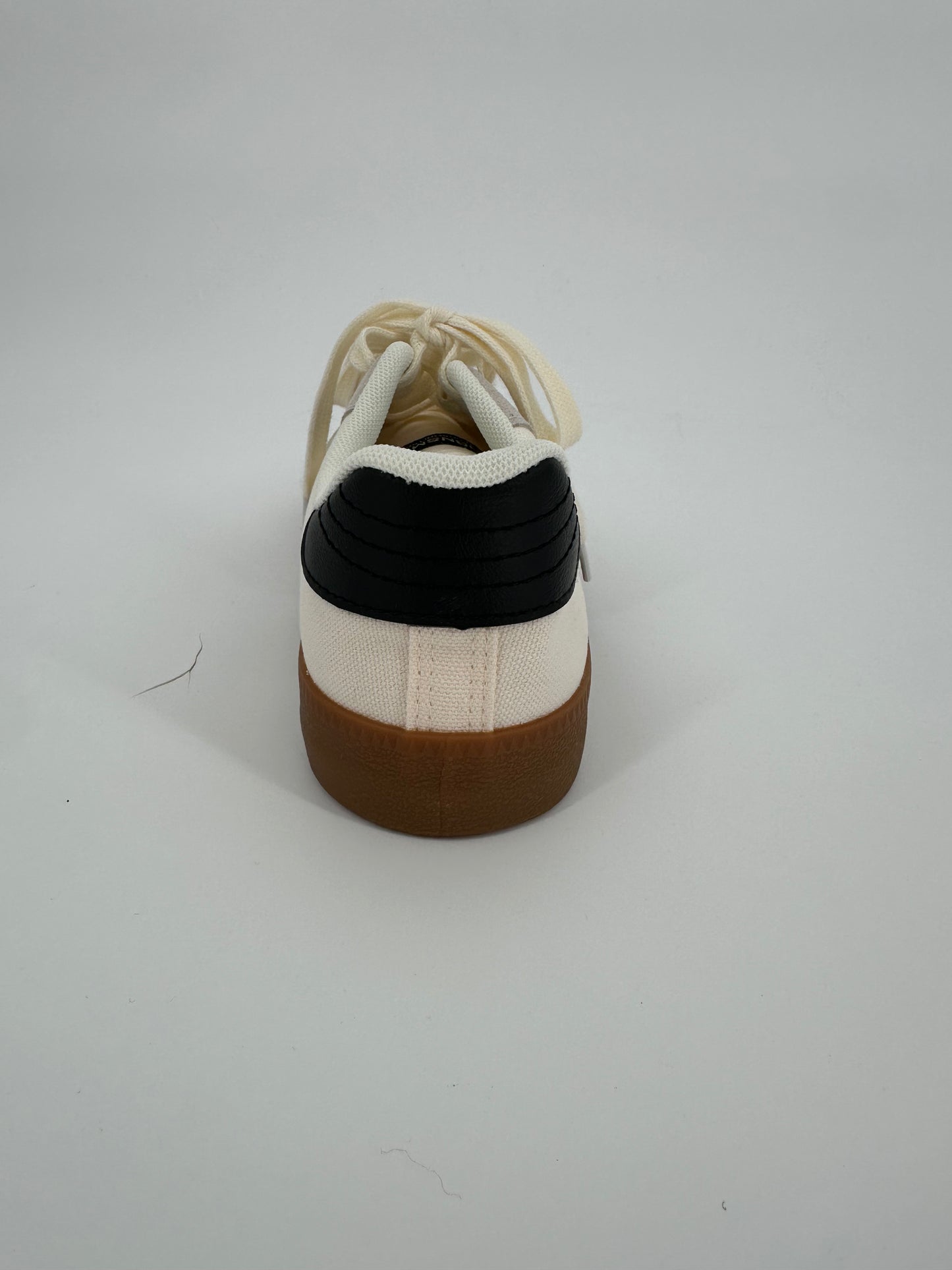 White Sneaker with Black Stripes and Trendy Sole