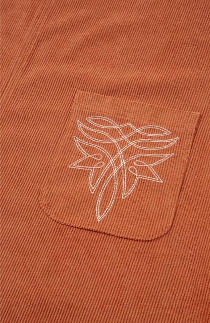 Sleeveless Rust colored dress with Accent Stitched Pocket Design