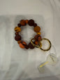 Handmade clay bead wrist key ring with colorful beads and adjustable strap, designed by Ivy's Gifts & Boutique.