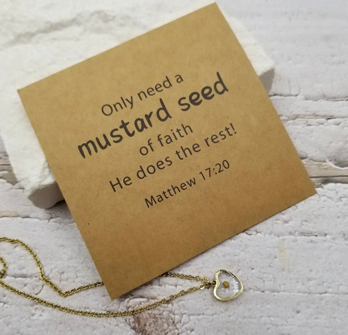 Mustard seed heart necklace by Ivy's Gifts & Boutique, featuring a sentiment card and delicate gold chain.