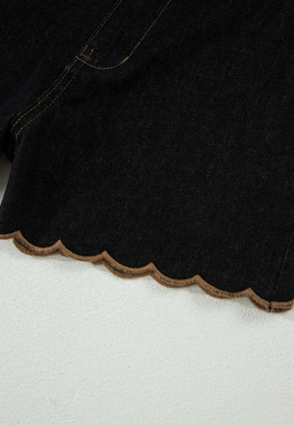 Black stretch denim scallop hem shorts from Ivy's Gifts & Boutique, featuring a stylish scalloped edge and fitted design.