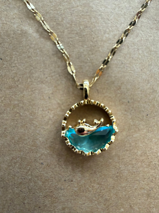 J18 Round Gold Dolphin Necklace with Acrylic Blue Water Detail