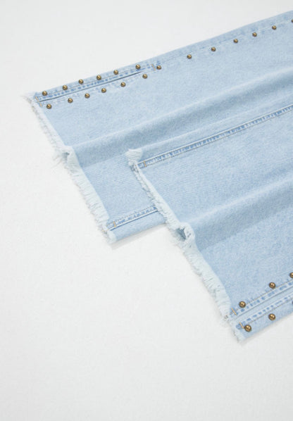 Light wash wide leg jeans with frayed hems, side splits, and studded accents from Ivy's Gifts & Boutique's ML16 collection.