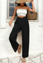 Black relaxed fit wide leg pants with pockets from Ivy's Gifts & Boutique, showcasing the comfortable, stylish design.