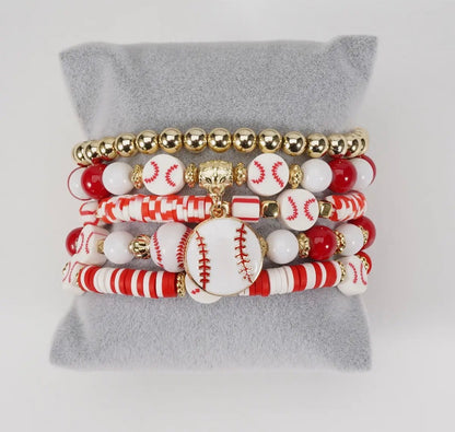 Red and white stackable stretch bracelet set with baseball theme, featuring baseball charms and beads from Ivy's Gifts & Boutique.