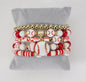 Red and white stackable stretch bracelet set with baseball theme, featuring baseball charms and beads from Ivy's Gifts & Boutique.