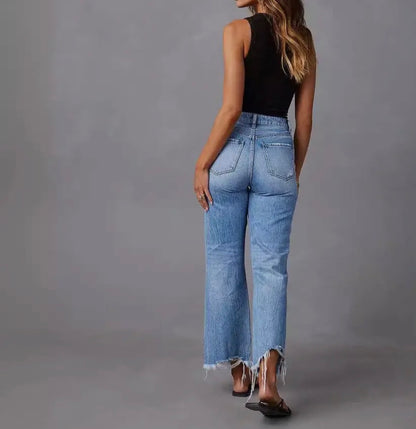 Light wash A113 distressed wide-leg jeans with fray hem from Ivy's Gifts & Boutique, showcasing casual, trendy denim style.