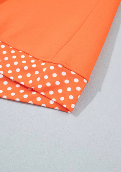 MLOPD Orange Long Sleeve Top with Polka Dot Accented Hem and Sleeve Trim