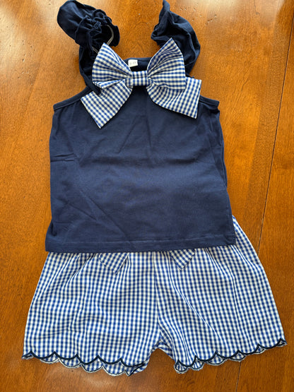 Navy gingham bow detail short set by Ivy's Gifts & Boutique featuring scallop hem design on matching top and shorts.