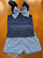 Navy gingham bow detail short set by Ivy's Gifts & Boutique featuring scallop hem design on matching top and shorts.