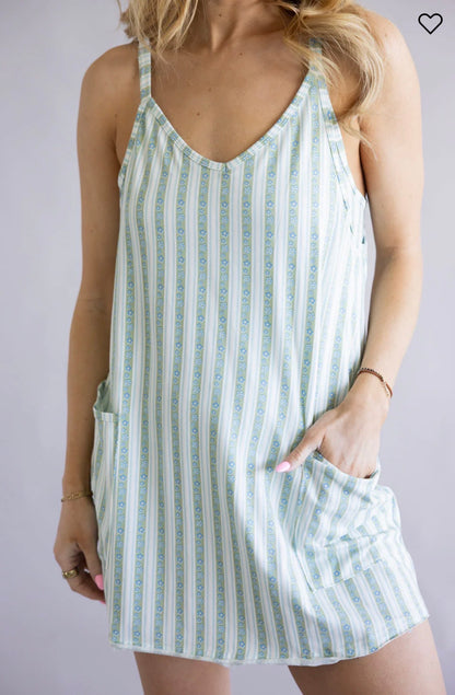 Floral print all-in-one romper from Ivy's Gifts & Boutique, featuring a stylish design and vibrant floral pattern.