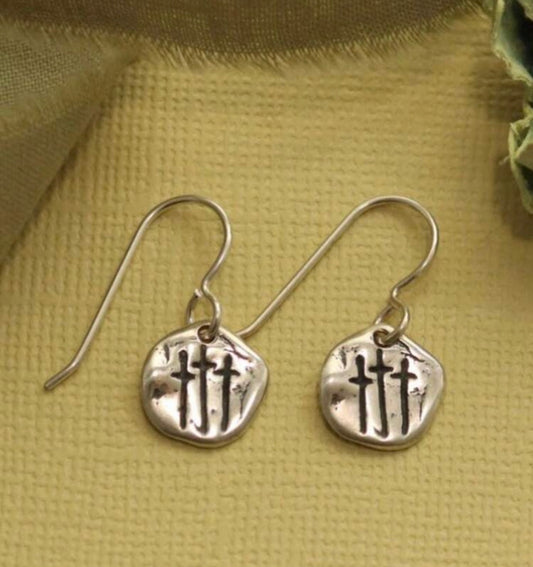 Hammered silver disc earrings with triple cross design by Ivy's Gifts & Boutique, showcasing a textured, stylish jewelry piece.