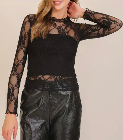 Black lace long sleeve trendy top from Ivy's Gifts & Boutique, featuring layered design and stylish fit.
