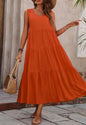 Orange tiered sleeveless dress with mid-length cut from Ivy's Gifts & Boutique, featuring a flowing, tiered design.