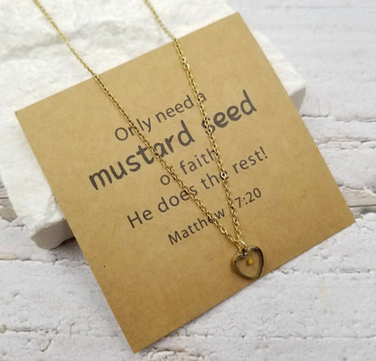 Golden mustard seed heart necklace by Ivy's Gifts & Boutique with sentiment card, featuring a delicate pendant on a fine chain.