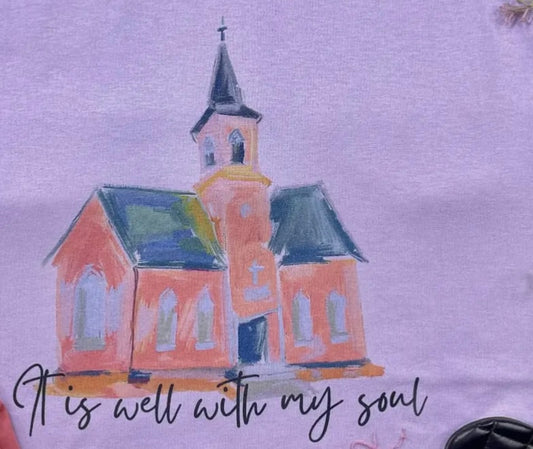 Framed wall art with the quote "It is well with my soul" from Ivy's Gifts & Boutique, featuring a serene design.