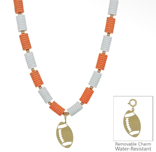 Orange and white beaded necklace by Ivy's Gifts & Boutique with a detachable football charm, perfect for sports fans.