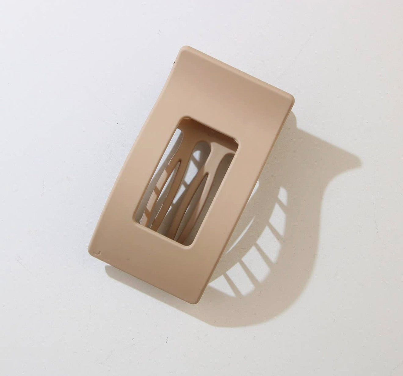 Ivy's Gifts & Boutique FR15 flat safety hair clip showing sleek design and secure grip for stylish, comfortable hair styling.
