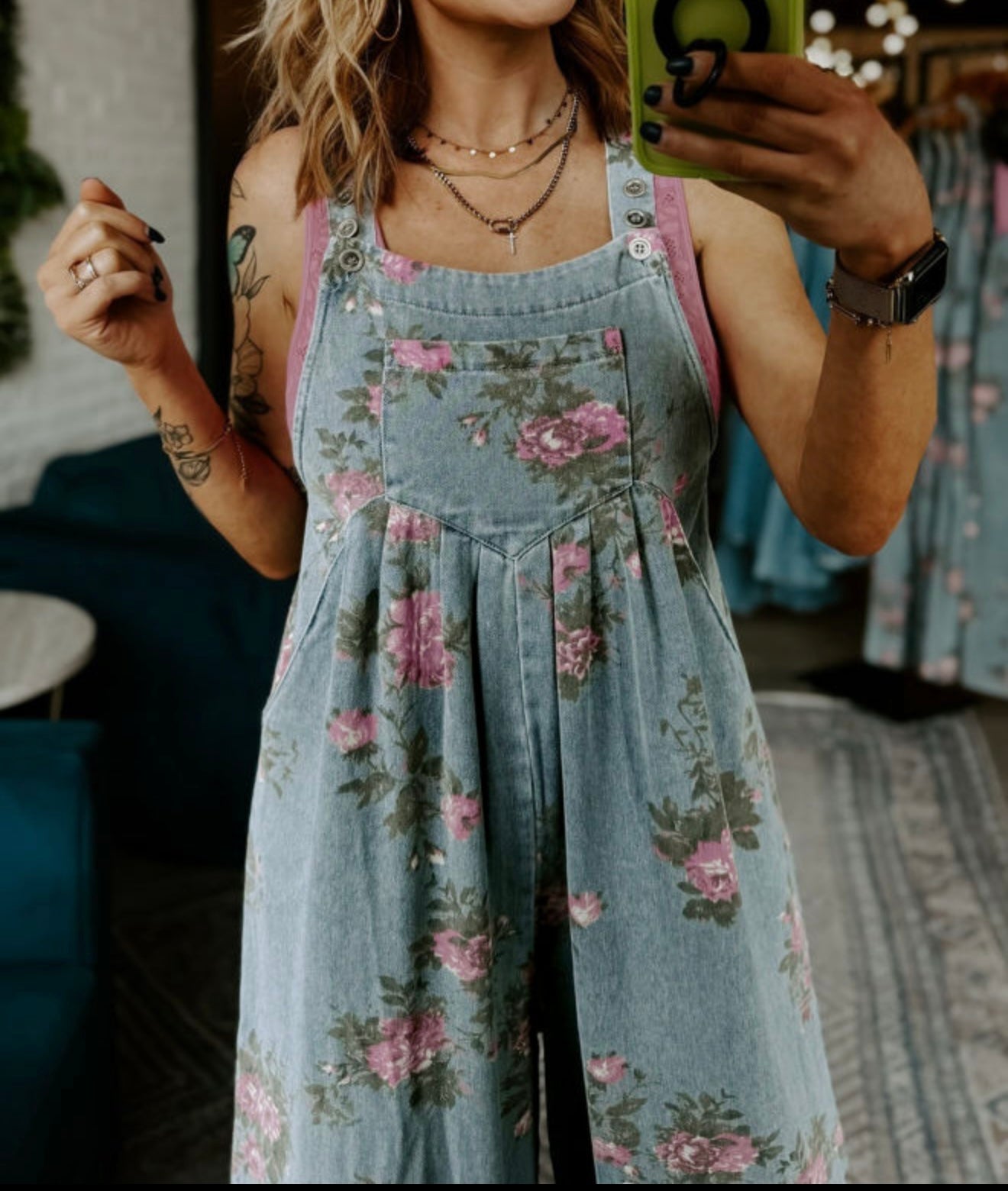 Floral print denim oversized overalls by Ivy's Gifts, featuring a relaxed fit and vibrant floral design.
