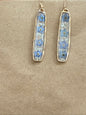 Blue and white dried flower drop pendant, 2.25 inches, from Ivy's Gifts & Boutique, featuring intricate floral details.