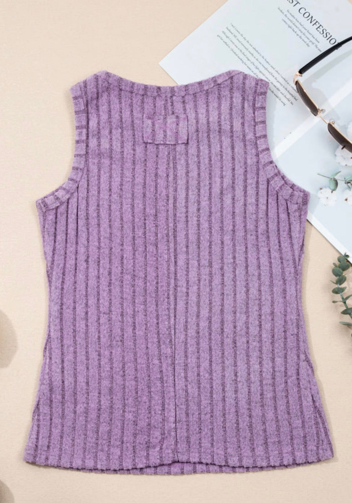 Lilac sleeveless ribbed top from Ivy's Gifts & Boutique, soft fabric, fitted design, displayed on a hanger