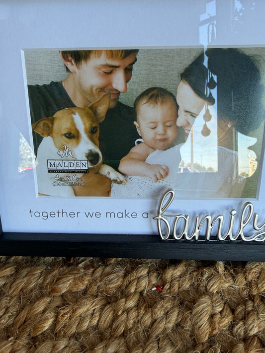 Black framed TGF "Together We Make a Family" wall art with metal family embellishment by Ivy's Gifts & Boutique.