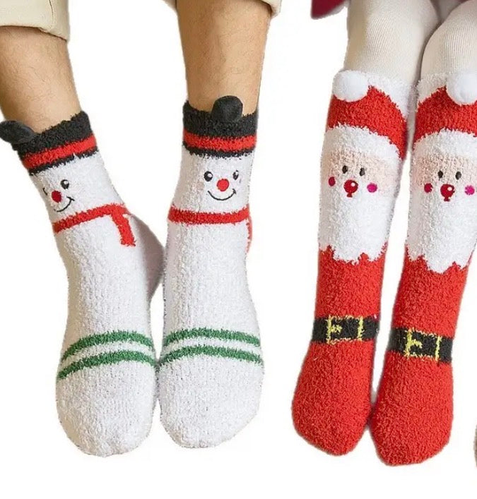 Ivy's Gifts & Boutique holiday socks with colorful pom pom accents, cozy knit fabric, perfect for festive winter wear.