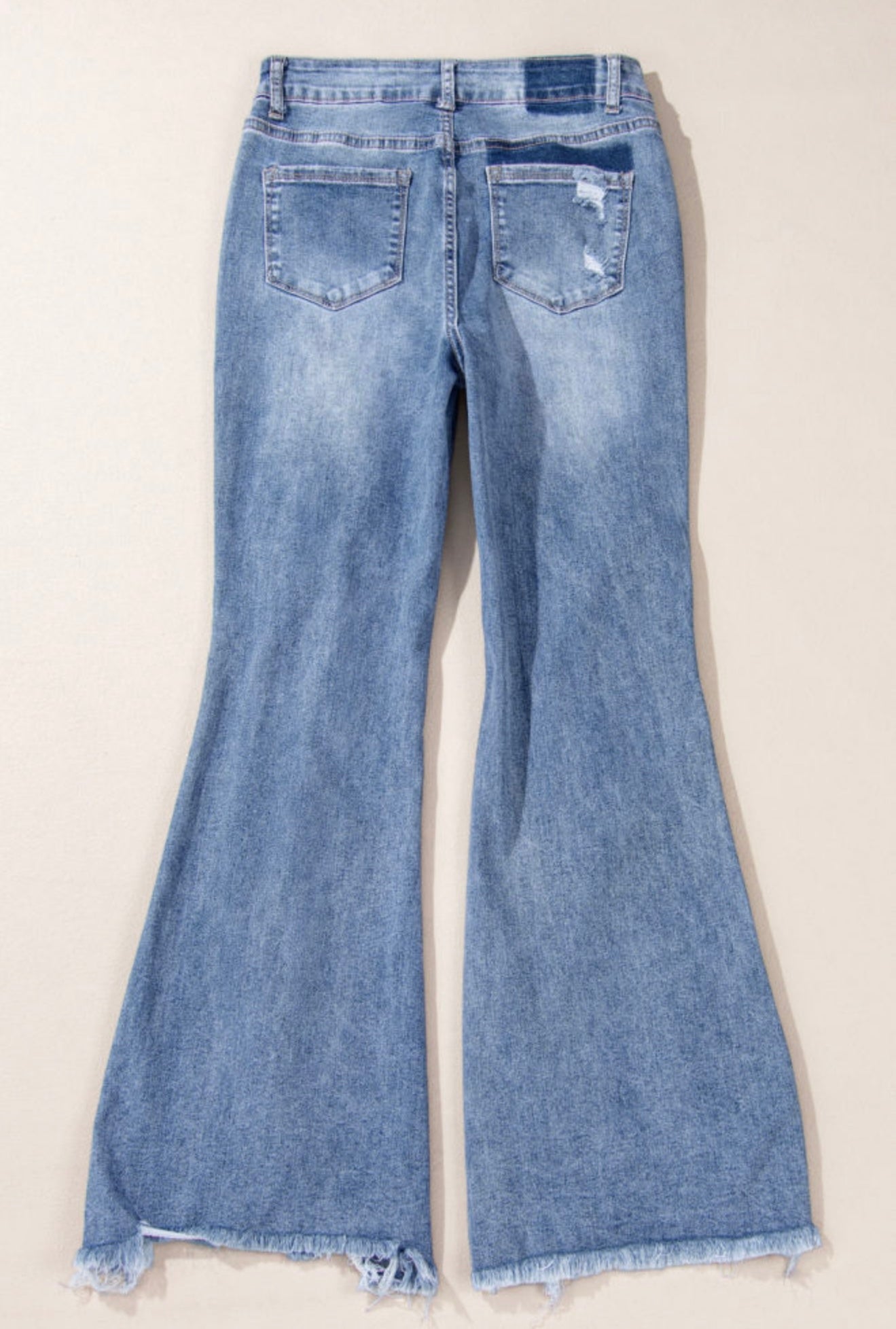Distressed Blue Jeans with Trendy Frayed Wide Leg Hem