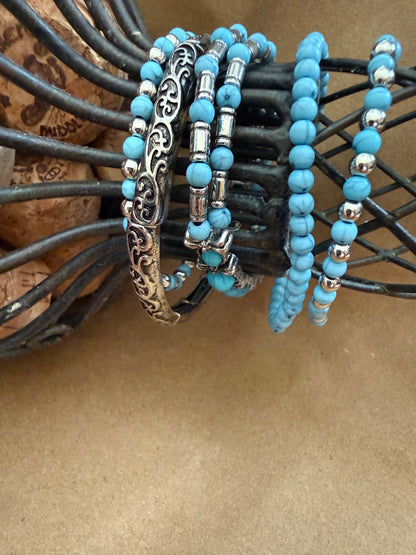 Set of five J19 faux turquoise stretch bracelets by Ivy's Gifts & Boutique displayed on a white background.